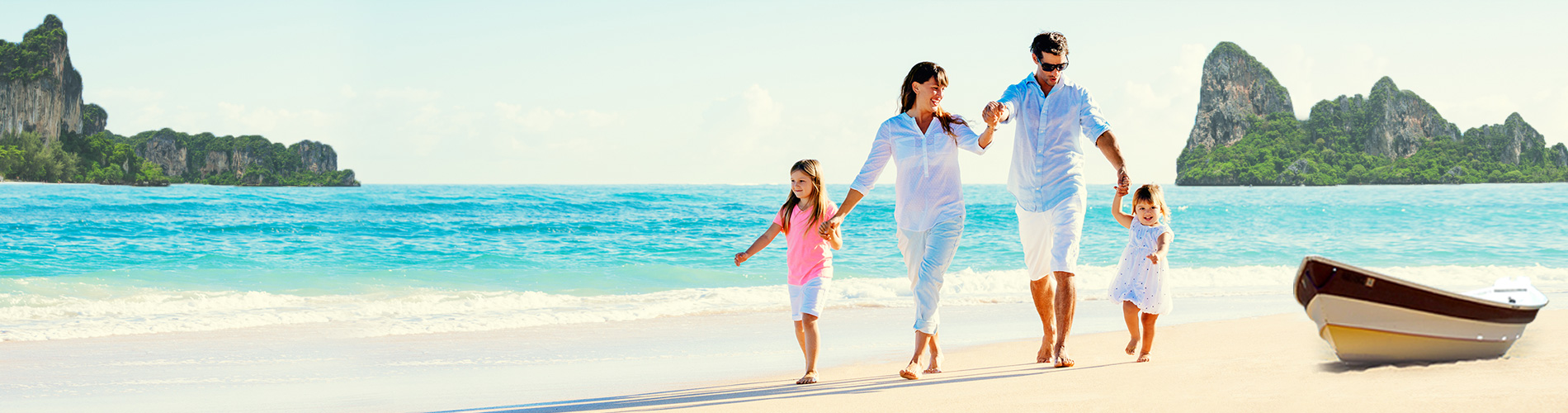 Family walking on kerala beach